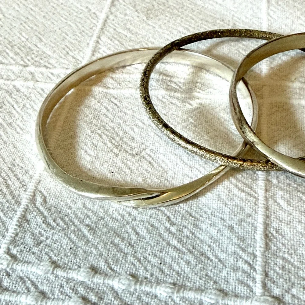 Set of 4 Silver Tone Bangle Bracelets to stack/layer
